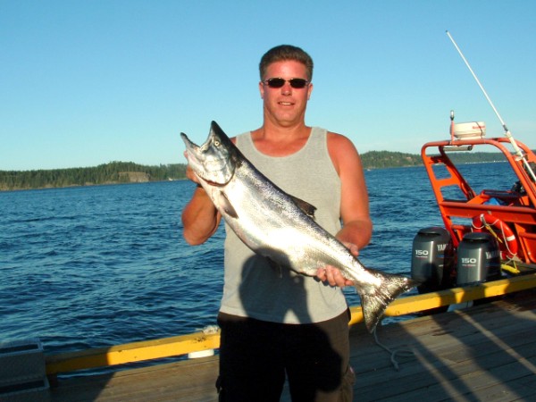 Amor Davis with his fish in hand