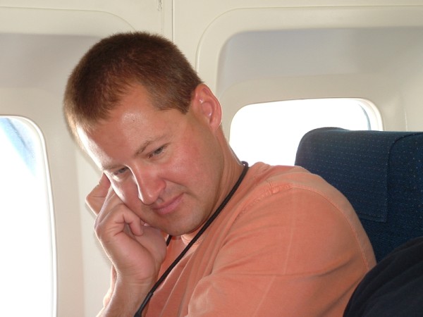 Peter Haug on the phone onboard