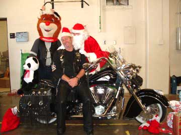 Bob "Doc" Kutzner getting some Santa sugar